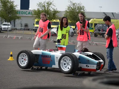 The Formula Student Newcastle Racing AI 2026 car on the track